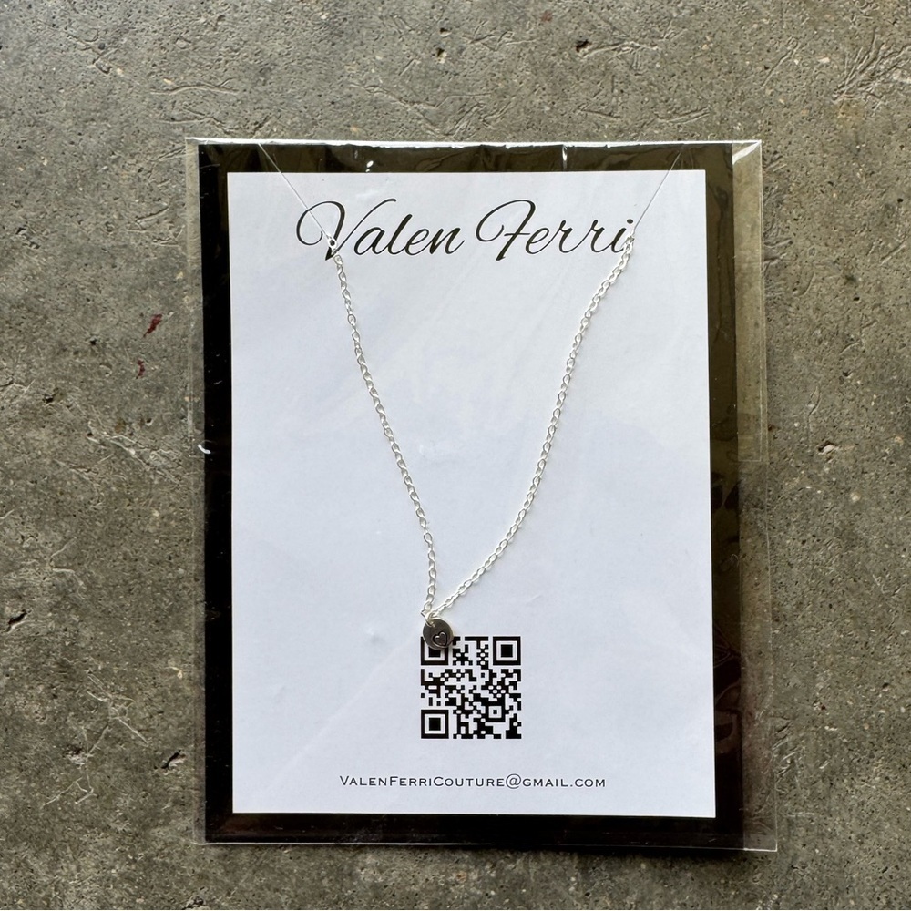 Silver heart shaped necklace